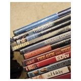 Lot of DVDs including "Munich," "The Bourne Identity," and "Shutter Island" among others