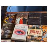 Collection of DVD Box Sets including Game of Thrones, Nip/Tuck, and Alfred Hitchcock