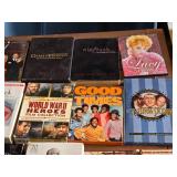 Collection of DVD Box Sets including Game of Thrones, Nip/Tuck, and Alfred Hitchcock