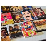 DVD and CD collection including Magnum P.I., Seinfeld, Tin Man, Burn Notice, Batman, and more