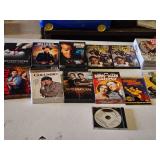 DVD and CD Collection including "Six Feet Under" Season 1, "Walker Texas Ranger" Season 2, and "Supernatural" Season 8