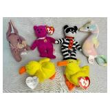 Collection of 20+ Beanie Babies and 4 Pound Puppies Collection of 20+ Beanie Babies and 4 Pound Puppies