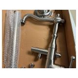 Free Standing Brushed Nickel Tub Faucet with Hand Shower. Never installed. In original box. Free Standing Brushed Nickel Tub Faucet with Hand Shower. Never installed. In original box.