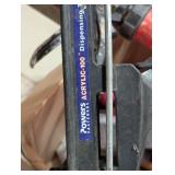 Box full of Adhesive and Caulk Guns