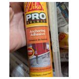 Box full of Adhesive and Caulk Guns