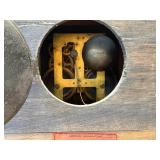 antique E. Ingraham Co. mantel clock, likely featuring a black ebonized wood case.