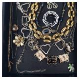 Assorted Costume Jewelry: Gold-Tone Chains, Silver Rings, Earrings & Pins Assorted Costume Jewelry: Gold-Tone Chains, Silver Rings, Earrings & Pins
