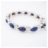 Nine West Silver Bracelet with Blue Oval Cabochon Stones Nine West Silver Bracelet with Blue Oval Cabochon Stones
