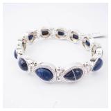 Nine West Silver Bracelet with Blue Oval Cabochon Stones Nine West Silver Bracelet with Blue Oval Cabochon Stones