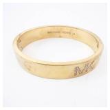 Michael Kors MK Logo Gold Tone Bangle Bracelet Michael Kors MK Logo Gold Tone Bangle Bracelet