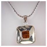 Amber Pendant in Sterling Silver with 18K Accents on Rope Chain Amber Pendant in Sterling Silver with 18K Accents on Rope Chain