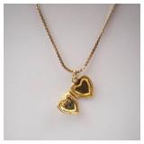 Gold-Tone Engraved Cross Heart Locket Necklace. Gold-Tone Engraved Cross Heart Locket Necklace.