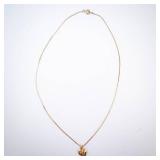 Gold-Tone Engraved Cross Heart Locket Necklace. Gold-Tone Engraved Cross Heart Locket Necklace.