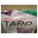 Miscellaneous lot with Panasonic Field Jacket, Adjustable Cargo Net (NEW), Tarp (NEW), 6-Pocket Organizer, Carry Bag and (2) Branded Stocking Caps