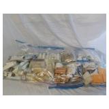 Multiple bags of soaps, conditioner and shampoos