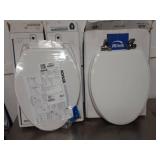2 new elongated toilet seats