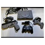 Vintage 90s PlayStation Console with controllers & light gun