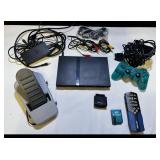 Sony PlayStation 2 Slim console bundle including controllers, cables, and accessories
