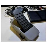 Sony PlayStation 2 Slim console bundle including controllers, cables, and accessories