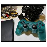 Sony PlayStation 2 Slim console bundle including controllers, cables, and accessories