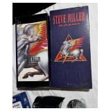 Vintage storage with cassette tapes empty Steve miller band case and more