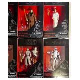 Collection of Star Wars action figures in boxes