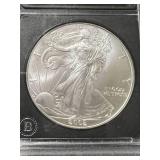 2002 AMERICAN SILVER EAGLE 1 TROY OZ .999 FINE SILVER SLABBED BU