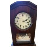 Wooden Mantel Clock Featuring A Wolf Themed Scene