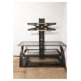TV Stand. black metal frame, tempered glass shelves, integrated swivel mount for flat screen TV. 50"x 21"x 52"