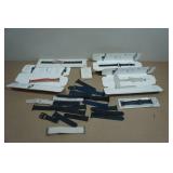 Asssortment of Apple Watch Bands and Charger