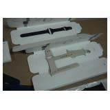 Asssortment of Apple Watch Bands and Charger