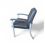 Lorell healthcare reception guest chair featuring black antimicrobial vinyl upholstery and a silver powder-coated steel frame. Lorell healthcare reception guest chair featuring black antimicrobial vinyl upholstery and a silver powder-coated steel frame.