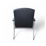 Lorell healthcare reception guest chair featuring black antimicrobial vinyl upholstery and a silver powder-coated steel frame. Lorell healthcare reception guest chair featuring black antimicrobial vinyl upholstery and a silver powder-coated steel frame.