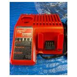 New - Milwaukee M18 REDLITHIUM CP2.0 Battery pack and a compatible multi-voltage charger