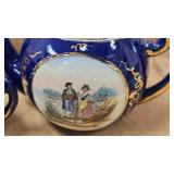 Coral Blue Tea Set and Porcelain Figurines