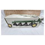 John Deere Four Bottom Plow in Box