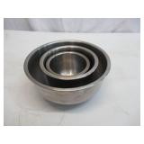 Assorted vintage stainless steel mixing bowls. Some with covers.