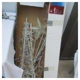 Lot of Christmas Decorating Items:9 ft. lighted Xmas Tree in box, Christmas tree stands, Storage bag and many lighting cords