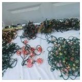 Lot of Christmas Decorating Items:9 ft. lighted Xmas Tree in box, Christmas tree stands, Storage bag and many lighting cords