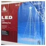 Lot of Christmas Decorating Items:9 ft. lighted Xmas Tree in box, Christmas tree stands, Storage bag and many lighting cords