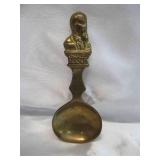 Lot of Brass tone Items: Large pot, Cup & Saucer, Trivets, Candle holders & Snuffer and more