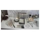 Lot of Bakeware: Bundt Pans, Baking Pans, Cooling Racks, Mixing Bowls, Utensils and more