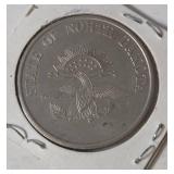 1889  ND Sitting Bull Souvenir Token.  Commemorates the year ND became a state. Featuring a portrait of Sitting Bull on the obverse and an American Seal on the Reverse.  - Lot 21