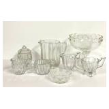 O1 - Vintage Glassware Assortment; Fenton Star Pattern Nappy 4.5 in - Jeanette Creamer & Sugar - Jeanette Covered Jar 5 in - 6 in Pitcher - 7.5 in Compote