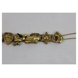 Police Theme Gold-Tone Charm Bracelet with Car, Badges & Shield Charms