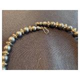 Hematite Bead Necklace - 18in with Floral Starburst Spacers