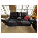 Two-Piece Living Room Set Featuring Loveseat with Center Console and Matching Three-Seat Sofa in Leather Two-Piece Living Room Set Featuring Loveseat with Center Console and Matching Three-Seat Sofa in Leather