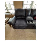 Two-Piece Living Room Set Featuring Loveseat with Center Console and Matching Three-Seat Sofa in Leather Two-Piece Living Room Set Featuring Loveseat with Center Console and Matching Three-Seat Sofa in Leather