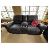 Two-Piece Living Room Set Featuring Loveseat with Center Console and Matching Three-Seat Sofa in Leather Two-Piece Living Room Set Featuring Loveseat with Center Console and Matching Three-Seat Sofa in Leather