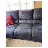 Two-Piece Living Room Set Featuring Loveseat with Center Console and Matching Three-Seat Sofa in Leather Two-Piece Living Room Set Featuring Loveseat with Center Console and Matching Three-Seat Sofa in Leather